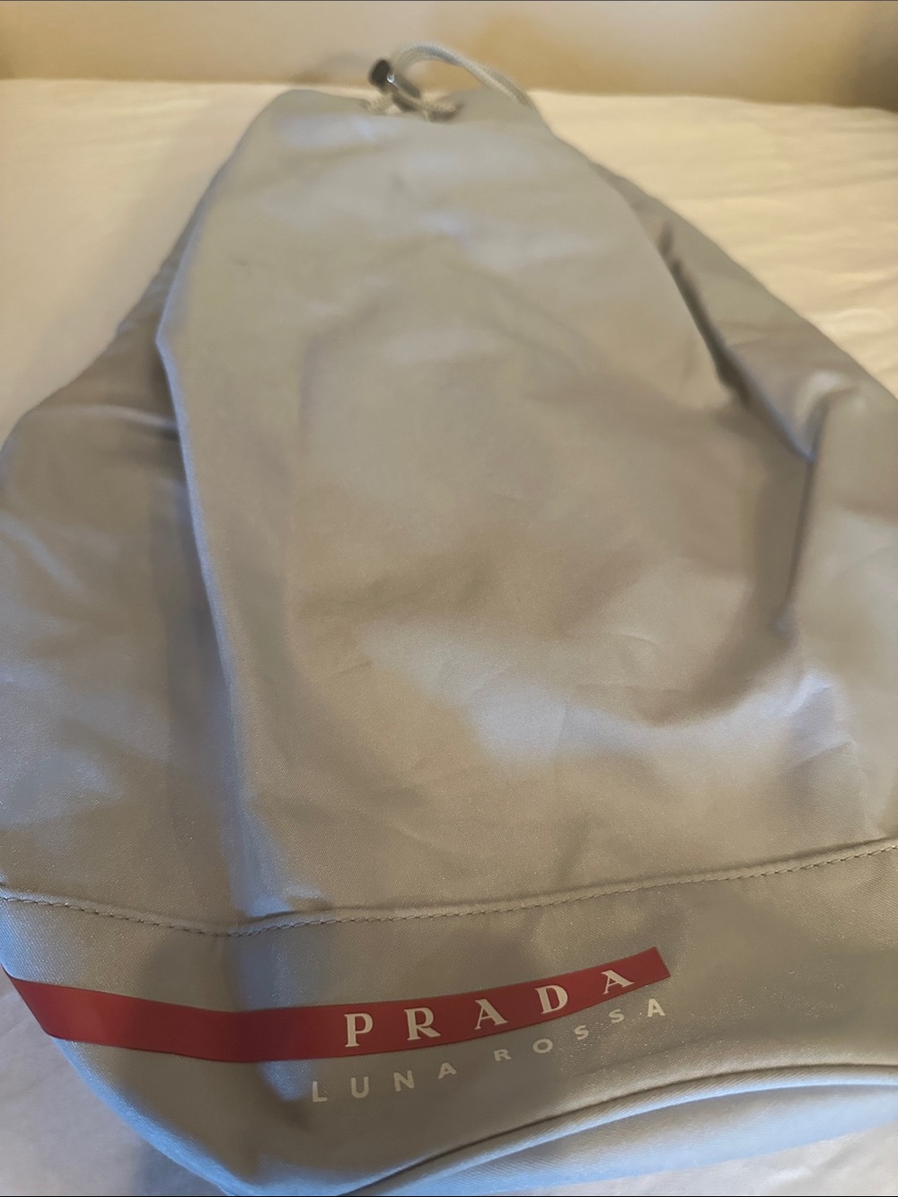 Prada Light Gray Backpack with Red Logo Stripe